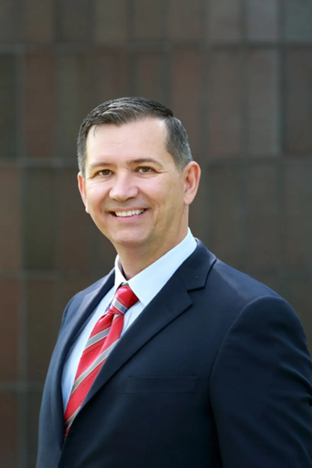 Dan Buehler in professional business attire